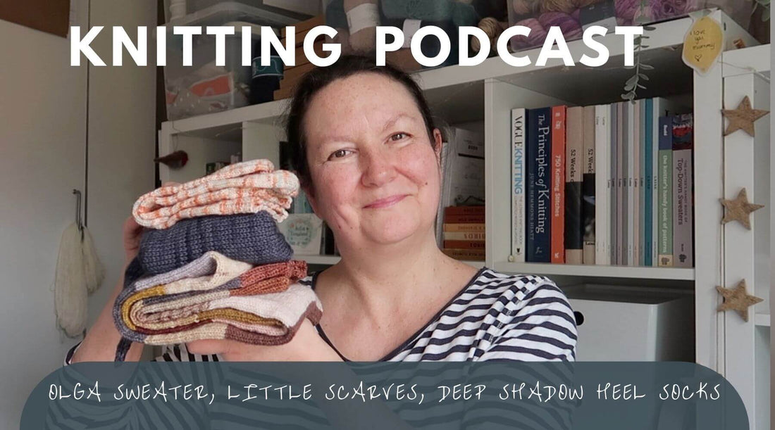 Finished knitting projects including Olga Sweater in night sky and almond tweed, Deep Shadow heel socks, Mae scarf, and colourblock tube scarf knit with Loom Wool fingering weight yarn