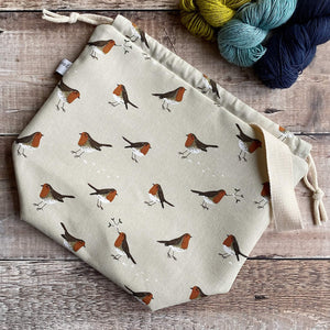 Handmade knitting project bag featuring a winter robin print, handmade by Eldenwood Craft