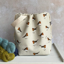 Load image into Gallery viewer, Handmade knitting project bag featuring a winter robin print, handmade by Eldenwood Craft
